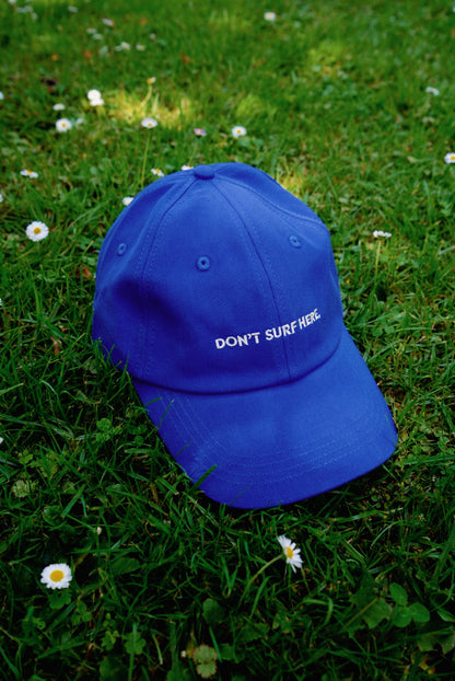 Don’t surf here dad cap